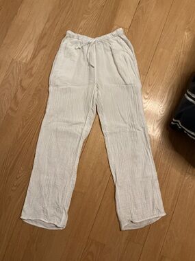 Little Moon white linen sail pants from Aritzia